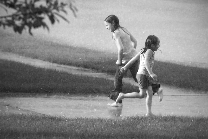 Playing barefoot in the rain