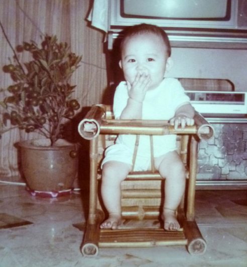 1985: In my wooden baby chair