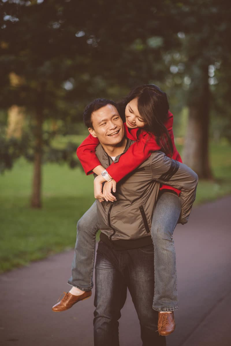 Engagement shoot: Ken giving me a piggyback ride in the forest-park