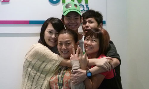 Group hug with morning deejays from UFM 100.3!