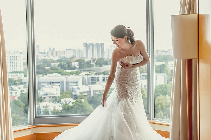 Wearing bridal gown