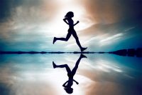 Silhouette of woman running
